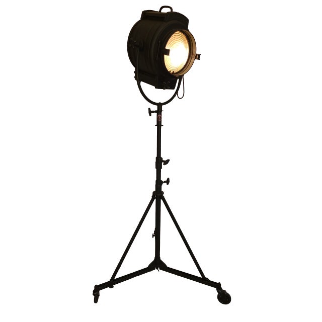 Original A.G. McAlister spotlight from the 1950's Hollywood. Set on a black rolling tripod, great condition.