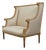French 19th Century Louis XVI Style Giltwood Wingback Settee with Carved Motifs For Sale