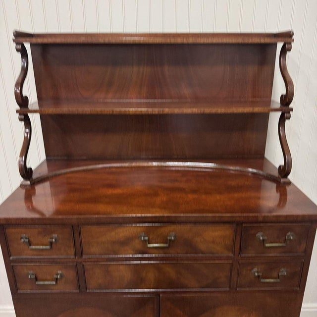 Vintage mid-century Heritage Henredon mahogany server cabinet, featuring a dettached waterfall-style plate shelf with...