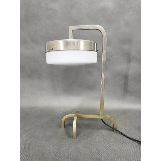 Exceptional and rare Bauhaus table lamp from 1930s Czechoslovakia, distinguished by its architectural composition and...
