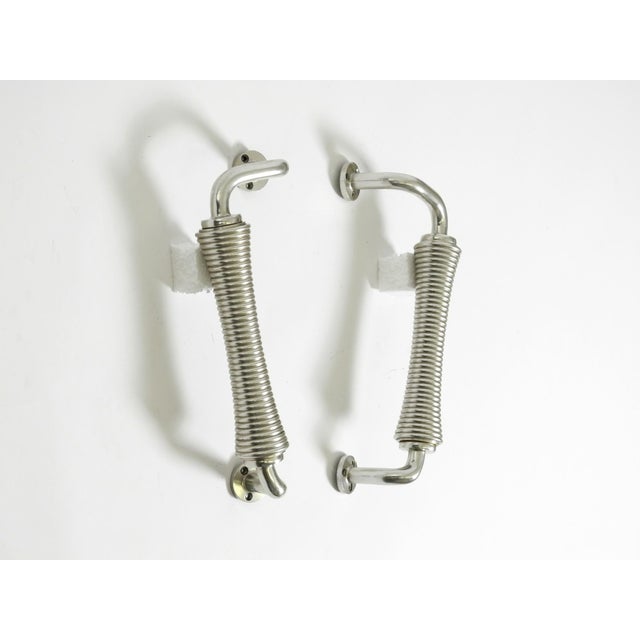 4 beautiful aluminum door handles featuring a 1960s design. Unique, high-quality design typical of the 1960s. Used only...