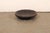 A Sumatran hand-carved wooden bowl from the early 20th century. This antique bowl from Sumatra has been masterfully hand-...