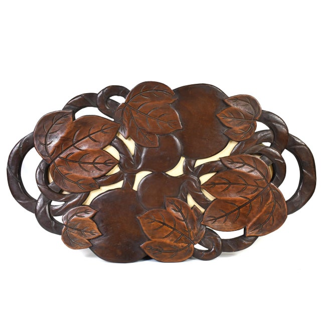 Beautiful and unique hand carved tray with leaves and fruit design is a great piece as a center piece or as a serving...