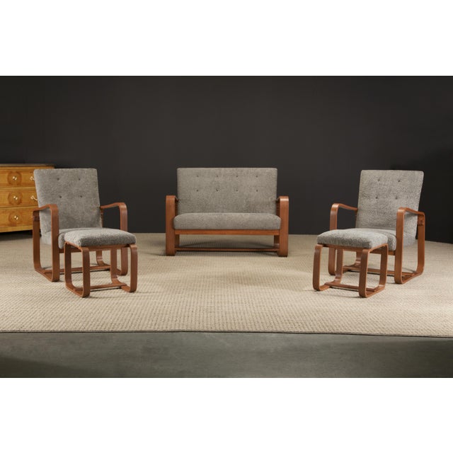 This rare five-piece (5) living room suite by Giuseppi Pagano, designed in 1939 for Bocconi University in Milan, is...