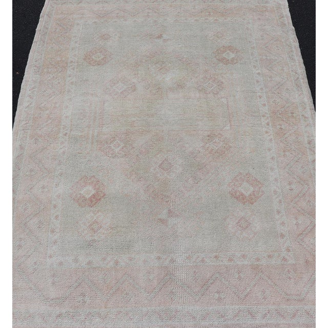 Textile Vintage Oushak Rug With Pastel Colors in Tan, Green, Butter Yellow, and Pink For Sale - Image 7 of 12