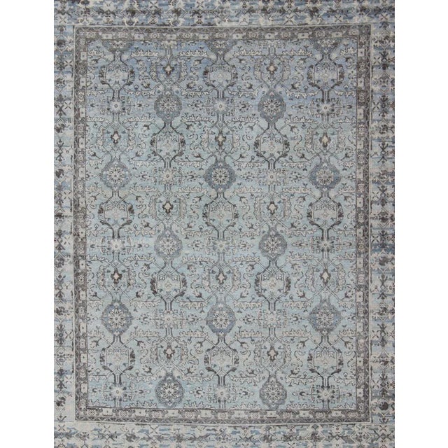 Measures: 8'0 x 10'0 Country of Origin: India; Type: Oushak; Design: All-Over, Sub-Geometric, Floral crest; Keivan Woven...