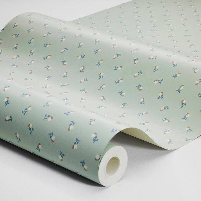 Sweet and simple, Petite Chérie is a delicate small-scale floral pattern. This charming surface-printed wallpaper is a...