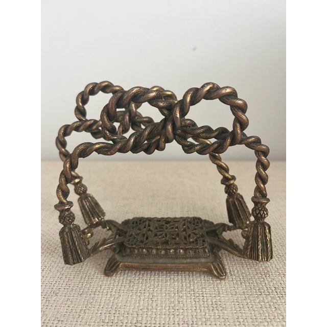 Vintage Hollywood Regency Italian Style Rope and Tassels gilt metal paper napkin holder. Nice addition on your dining room...