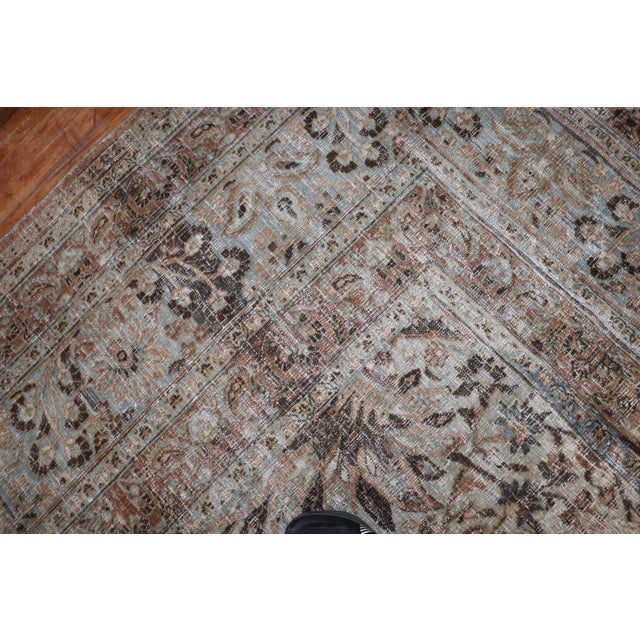 Beautifully worn oversize Persian Meshed rug from the early 20th century. Durable enough to endure heavy traffic if...