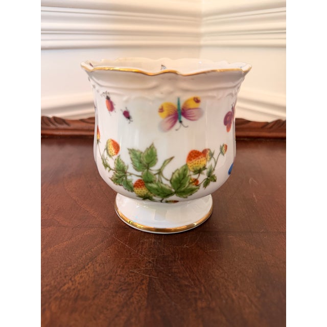 Delightful vintage porcelain cachepot by Ardalt Japan, featuring a charming hand-painted design of colorful butterflies,...