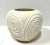 A Contemporary style decorative ceramic centerpiece bowl, unbranded. Beige in color with white swirl patterns throughout....