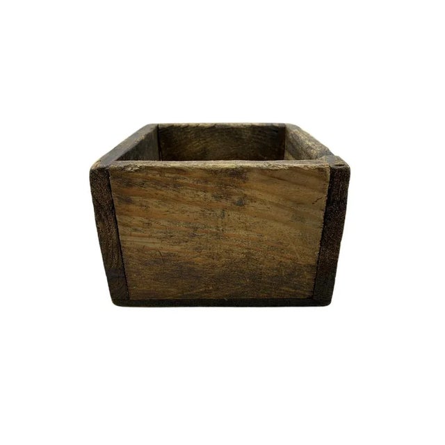 This antique small wooden box hails from Hungary, exuding rustic charm and rich cultural heritage. Its compact size hints...