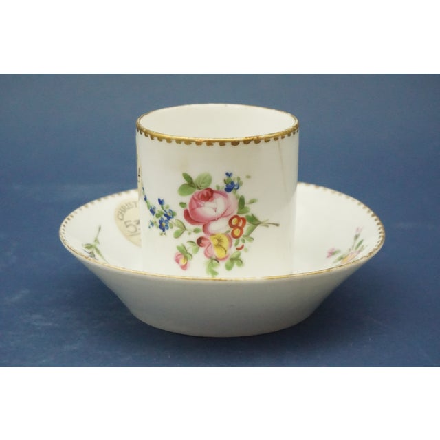 MEASUREMENTS: Height of cup + saucer: 7.8 cm Diameter of cup: 6.5 cm; with handle: 8.7 cm; Diameter of saucer: 12.7 cm...