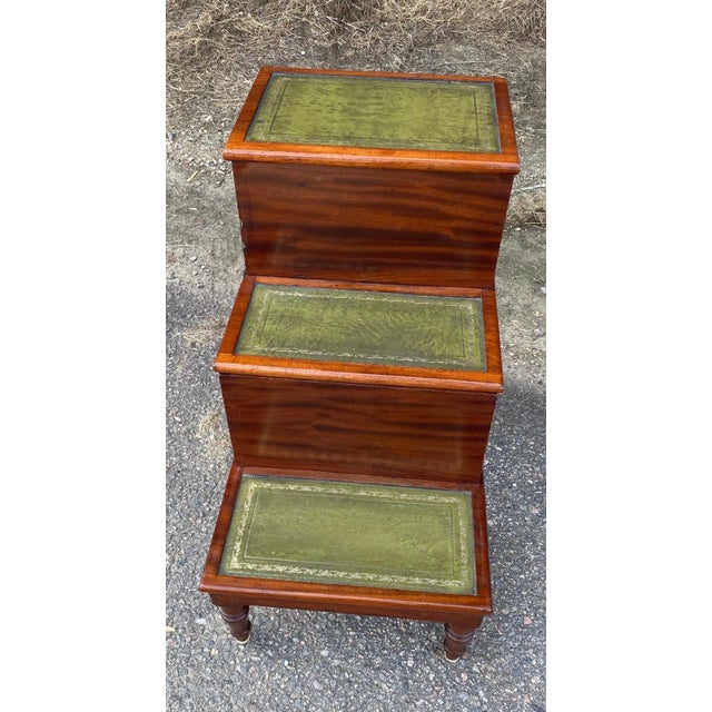 Great set of 19th century English mahogany and leather bedsteps with sliding chamber drawer.
