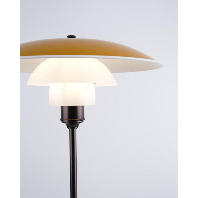 Ph 3½-2½ table lamp from louis poulsen designed by poul henningsen in yellow metal and burnished brass. Classic danish...