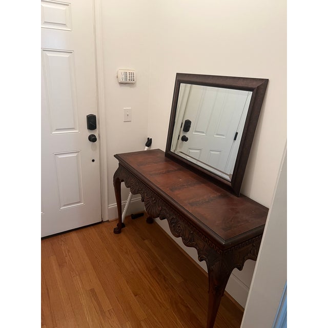 Antique Table standing at almost six feet in width. An exceptional, carved mahogany console or sofa table, perfect for a...