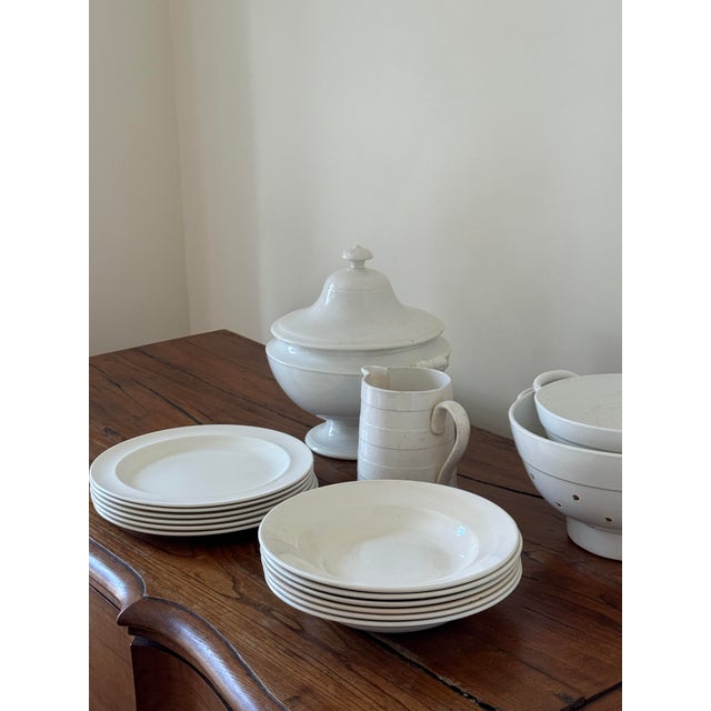 16 piece collection of antique & vintage Belgian, Dutch & English creamware. Includes 6 bowls, 6 lunch plates, one...