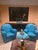Large 1980s veneered sideboard. Veneered wood sideboard. The sideboard features five doors, each with a central shelf, and...