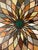 Impressive early 20th century Italian pietra dura marble center table featuring a striking geometric flower-form top with...