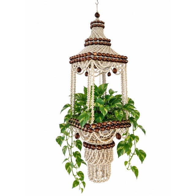 Exceptional large vintage hanging planter composed almost entirely of natural seashells and delicate strung shellwork,...