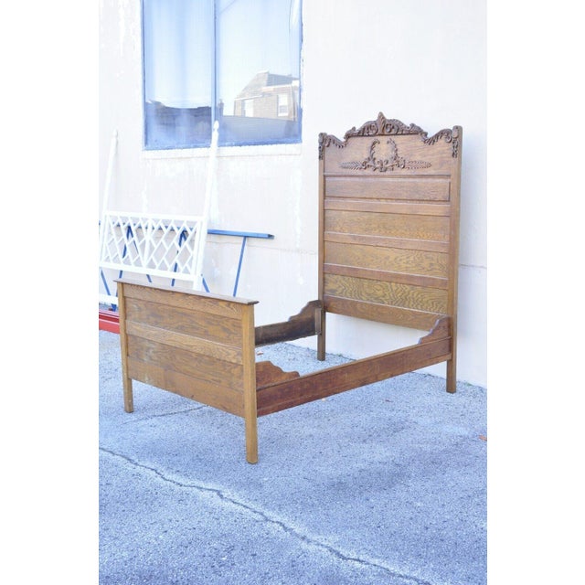 Antique Eastlake Victorian Oak Wood Tall Headboard Full Size Bed Frame. Item featured is a full size frame, tall headboard...