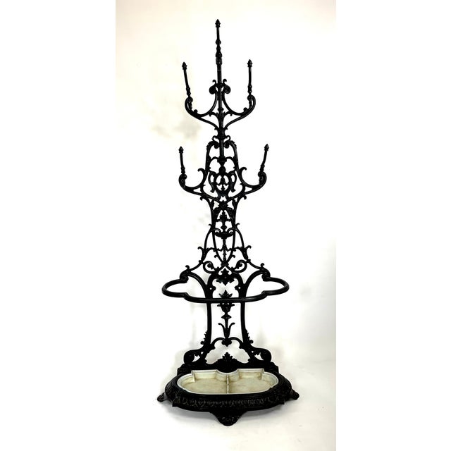 This spectacular cast iron coat rack and umbrella stand dates from the second half of the 19th century. It comes from a...