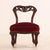 The petite salon or slipper-form accent chair features an elegant open balloon-back silhouette made from solid, richly...