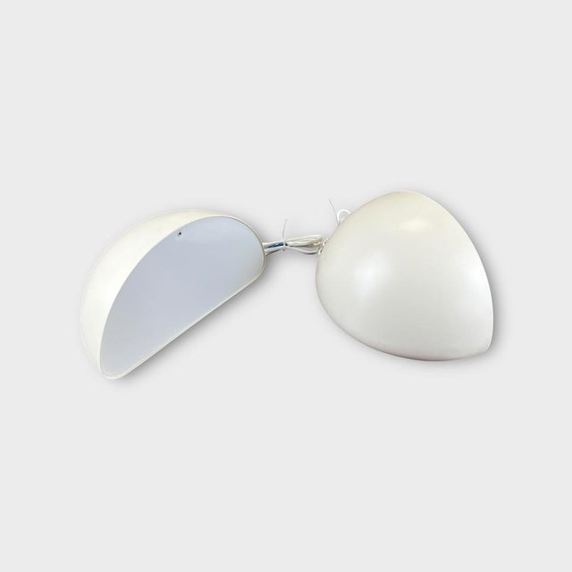 Very good condition, functional, with slight scratches visible in the photos. The lamps have holes for hanging on the wall...