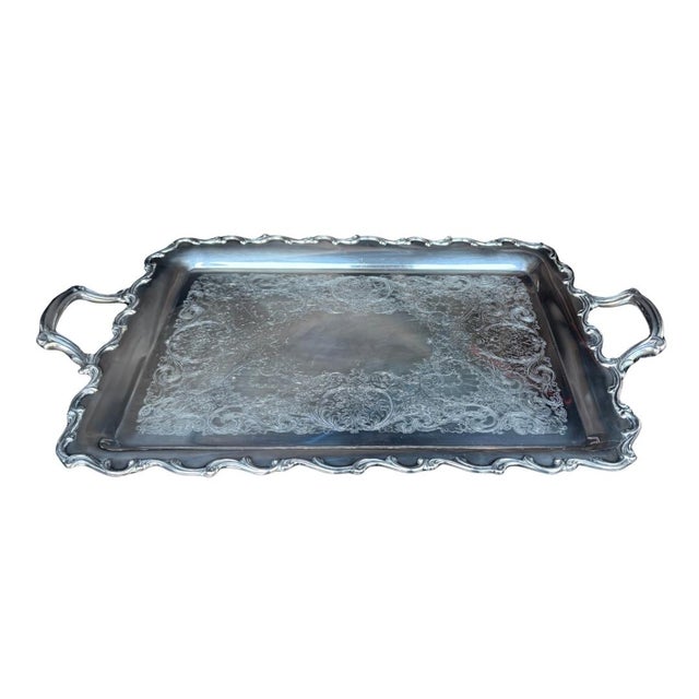 This is a silver plated serving tray made by Webster Willcox in the “Joanne” pattern. Likely made between 1960-1980, this...