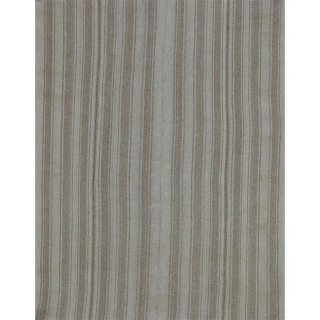 This fun tribal rug is a beautiful flat weave Scandinavian Style Kilim rug featuring a vibrant alternating multi-colored...