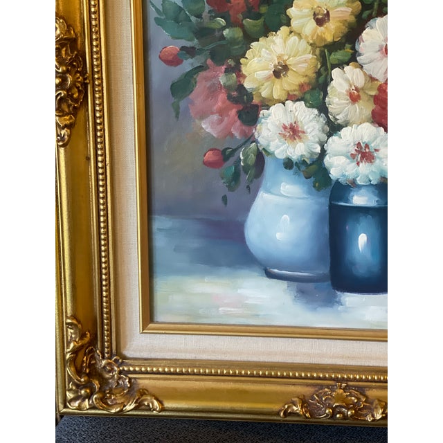 This beautiful still life features a stunning assortment of florals and is an original one-of-a-kind oil on canvas signed...