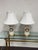 Design Plus Gallery presents a Pair of Ceramic Apothecary Vintage Column Table Lamps. Each lamp pairs a glossy white...