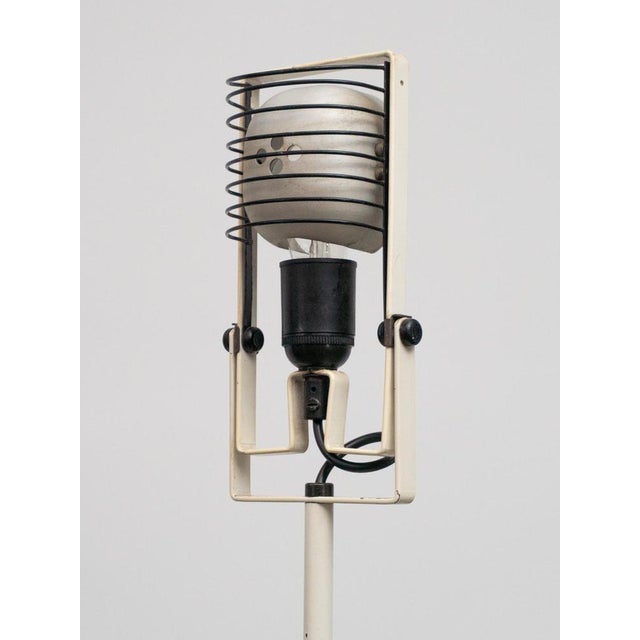 Sintesi Terra articulated floor lamp made in black and white powder-coated steel, Designed by Ernesto Gismondi for...