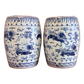 Chinoiserie Porcelain Blue and White Dancing Foo Dogs Garden Stools - A Pair For Sale
