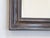 This dark silverleaf accent mirror has a dark pewter tone and measures 17.5"H x 16.25"W.