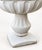 Beautiful, antique-style decorative stone planter in two pieces. Dimensions: height 73, width and depth 76. Base width 40x40.