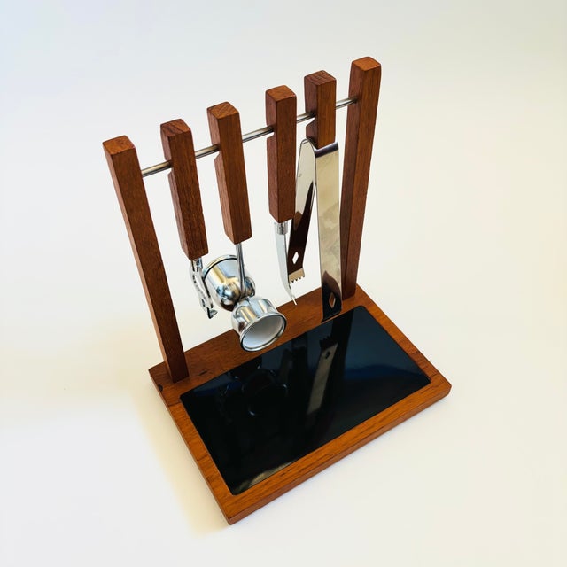 A mid century vintage hanging bar tool set, designed by Georges Briard. Nice minimalist design with simple rectangular...