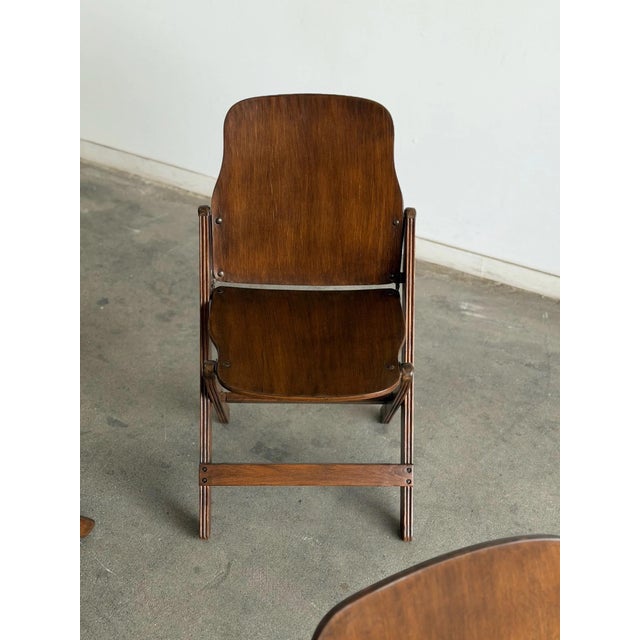 W17.5 D18 H30 SW15 SD16 SH17 Vintage folding chairs by American Seating Company, Grand Rapids, Michigan, featuring molded...