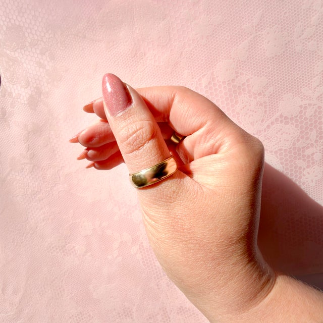 About This Ring: A substantial vintage gold band graced with fine milgrain detailing on both edges. Built by Benchmark to...