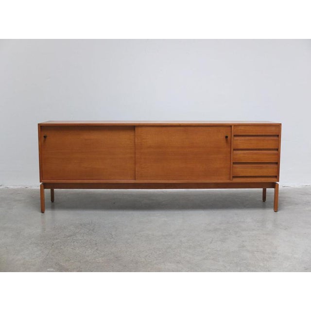 Classic Jos De Mey sideboard with sliding doors from the ‘Abstracta’ series produced by Van Den Berghe-Pauvers circa 1960....