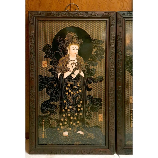 A pair of Chinese framed porcelain Buddhist temple plaques of standing Kuan Yin, a near pair of finely drawn depictions of...