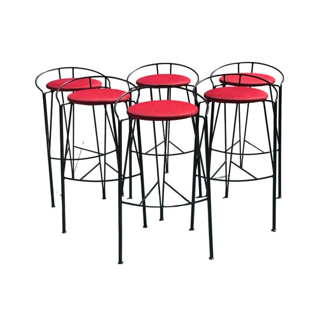 Striking set of six vintage bar stools by Vecta of Grand Prairie, Texas. These sculptural stools feature slender black...
