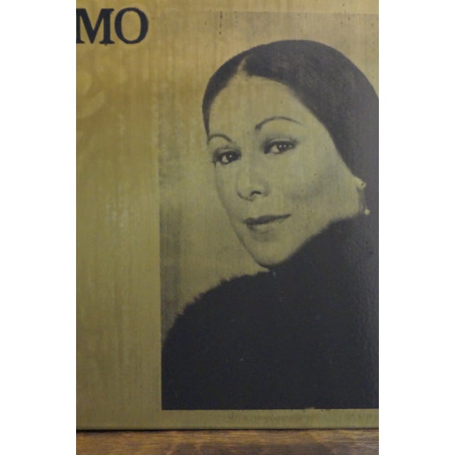 A sign which is printed on metal for a performance of the legendary Mexican opera singer Gilda Cruz Romo. This sign was...