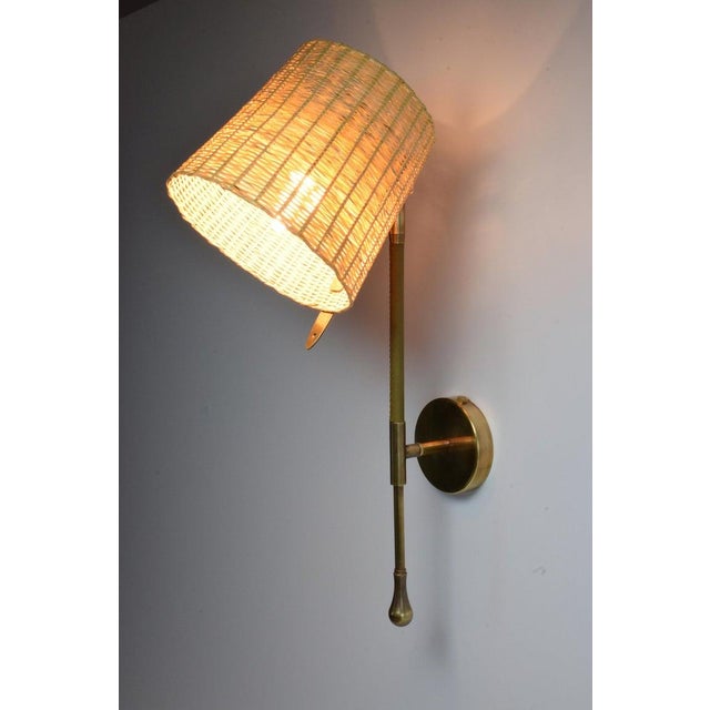 Our bestseller, the Ancora-W2, is a handcrafted articulating wall light fixture composed of a solid brass structure...