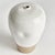 This terracotta vase is finished in a shinyWhite reactive glaze with a raw clay base, which is the natural touch that...