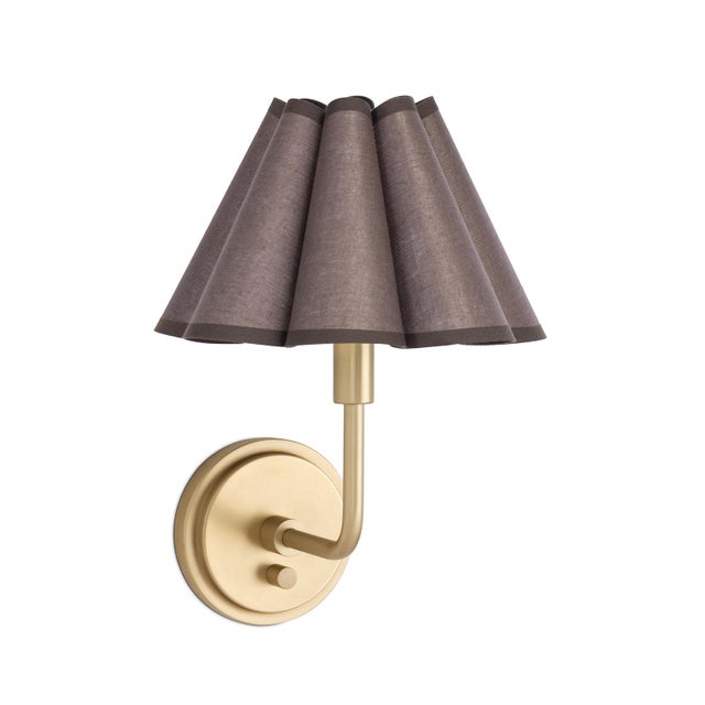 The Polly Wall Sconce brings an air of refined elegance with its single scalloped shade, casting a warm and comforting...