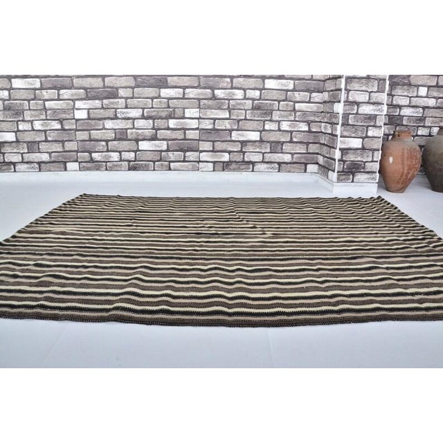 Turkish Vintage Mid-Century Turkish Striped Kilim Rug With Muted Earth Tones For Sale - Image 3 of 11