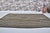 Turkish Vintage Mid-Century Turkish Striped Kilim Rug With Muted Earth Tones For Sale - Image 3 of 11