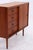 Vintage chest of drawers by Musterring with a well-thought-out layout of four drawers and a compartment behind the sliding...