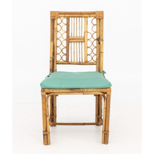Chinese Chippendale Style Bamboo Side Chair, with cane-paneled seat and teal blue seat cushion. 38.5" H x 20" W x 21" D;...